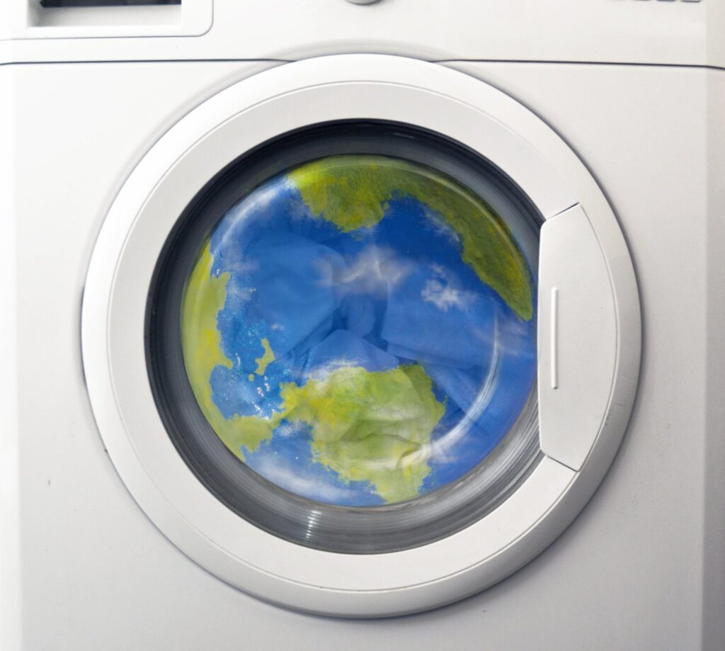 A washing machine with the globe showing in its window.